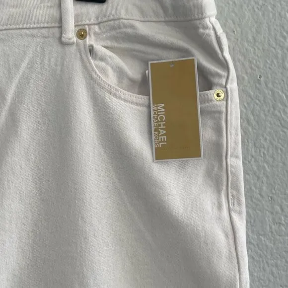 Micheal Kors - Straight leg cropped jeans with Gold button. Size:16 Color: White