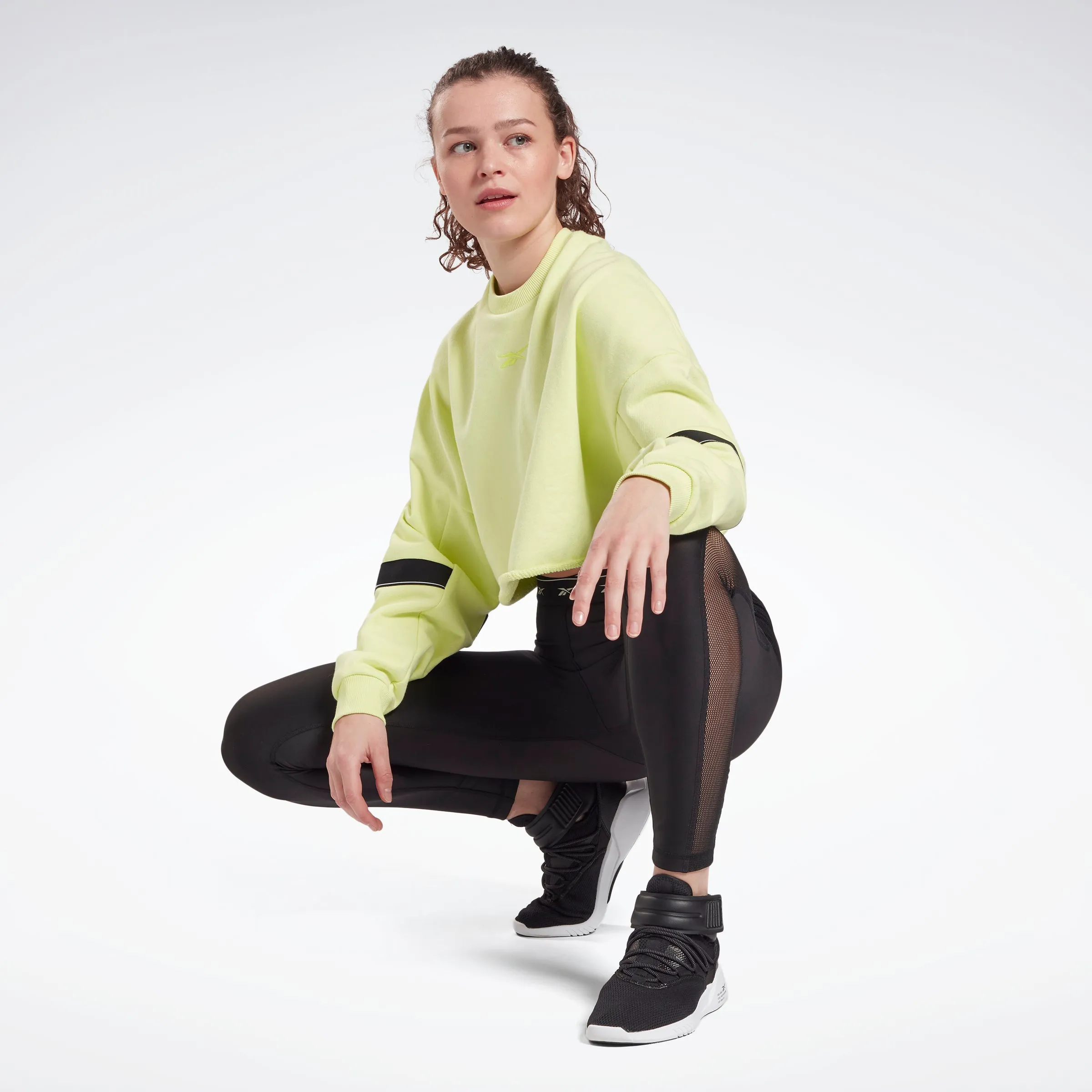 Reebok Apparel Women Studio Cropped French Terry Crew Sweatshirt Eneglw