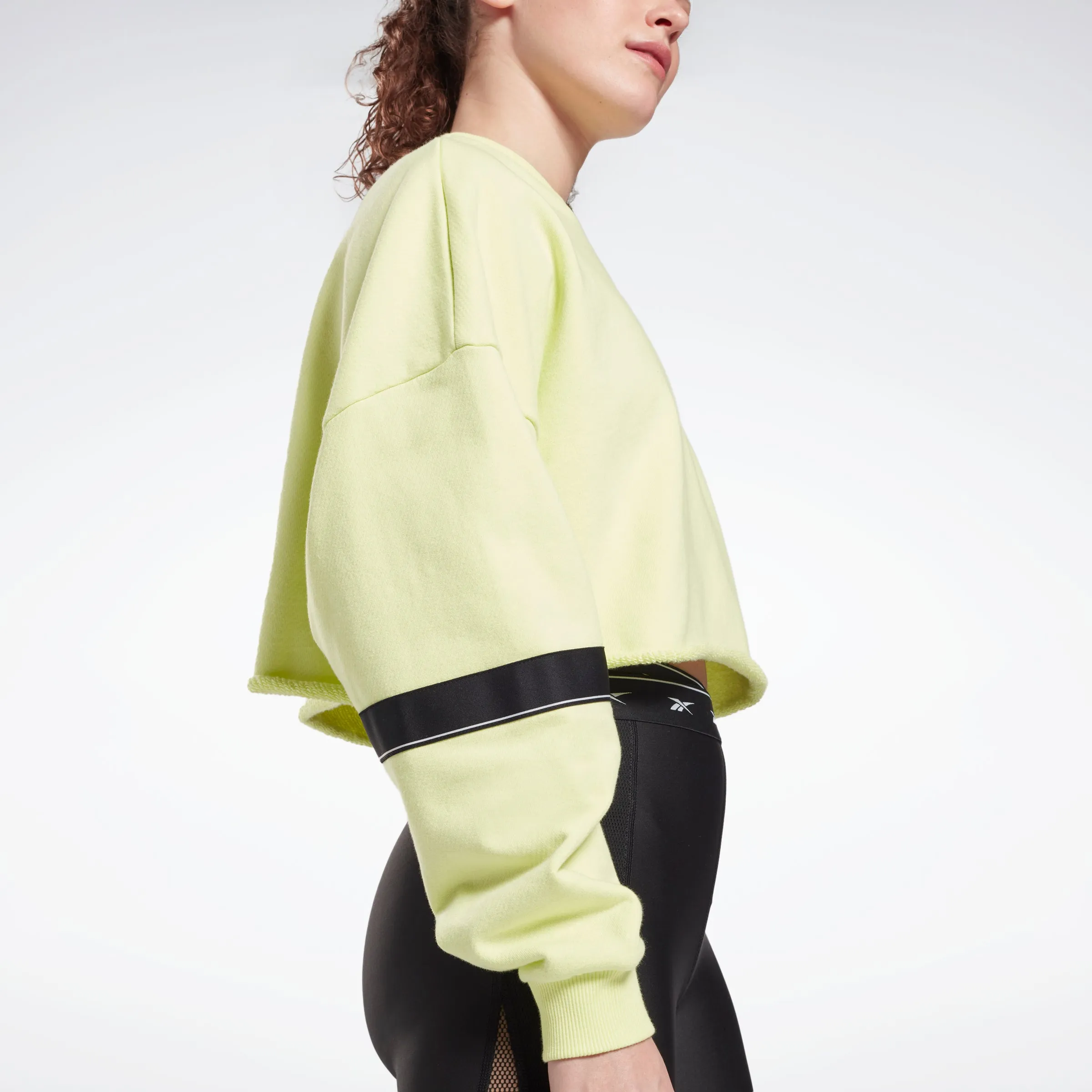 Reebok Apparel Women Studio Cropped French Terry Crew Sweatshirt Eneglw