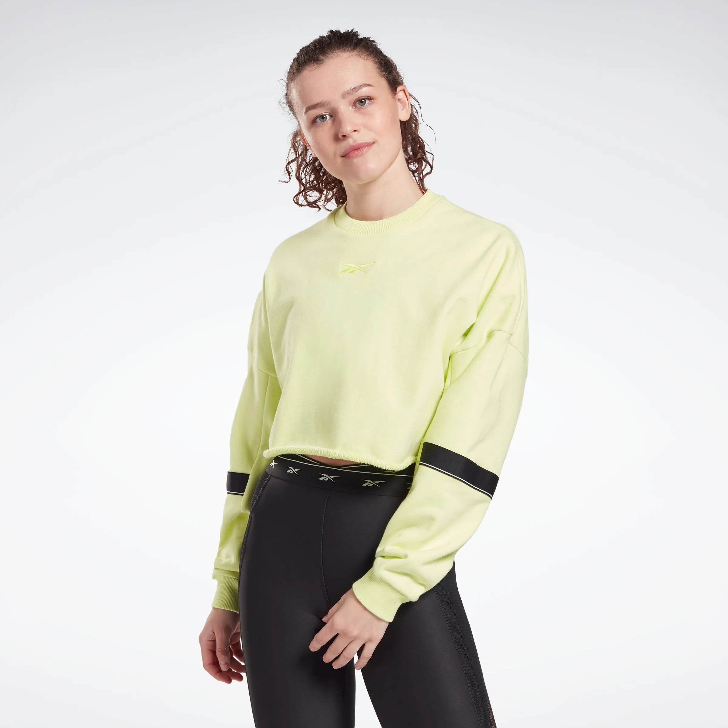 Reebok Apparel Women Studio Cropped French Terry Crew Sweatshirt Eneglw