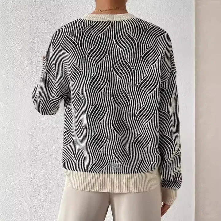 Warm ladies' knitted jumper with turtleneck